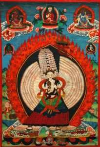 Sitatapatra-Aparajita. Tanka. Pintura caligráfica sobre tela enmarcada. S. XVII. Tibet.