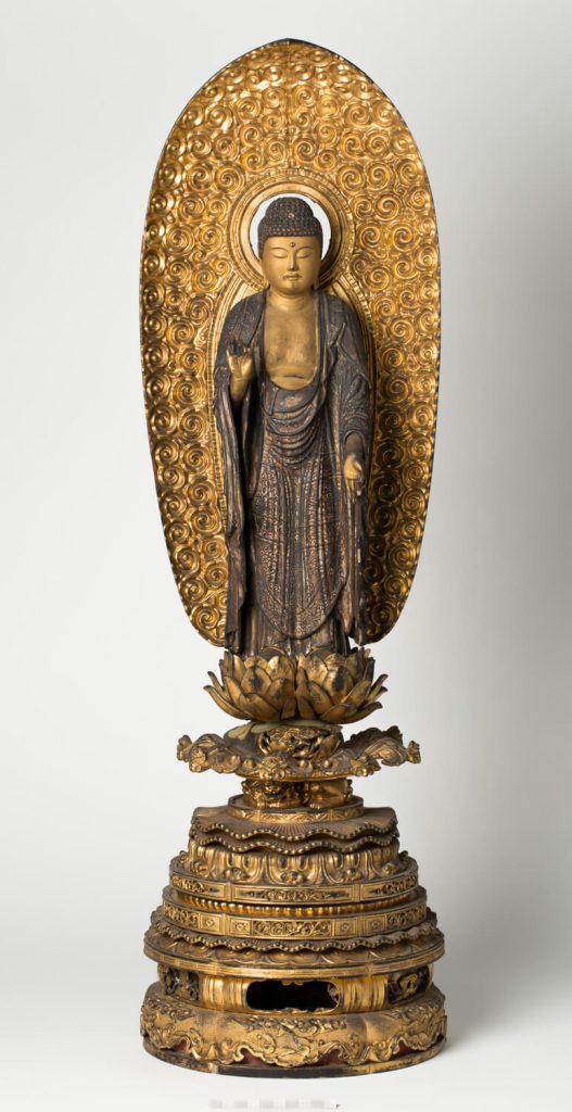 Buda Amida Misericordioso. Madera dorada y lacada. Japón. S. XVII.