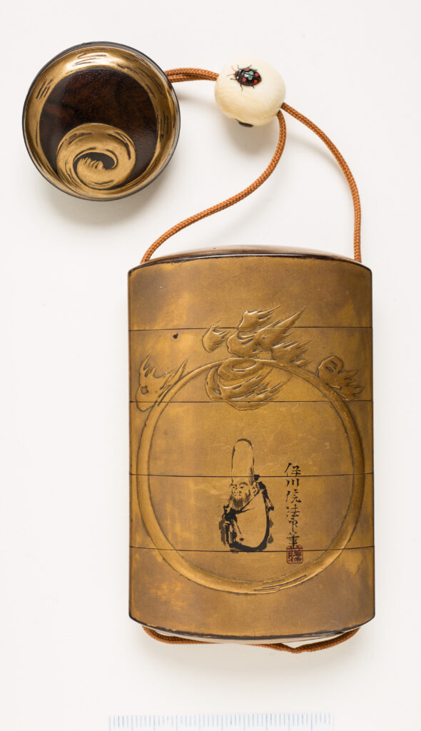 Estuche (inrō). Rakuko. Laca urushi. Japón. S. XIX.